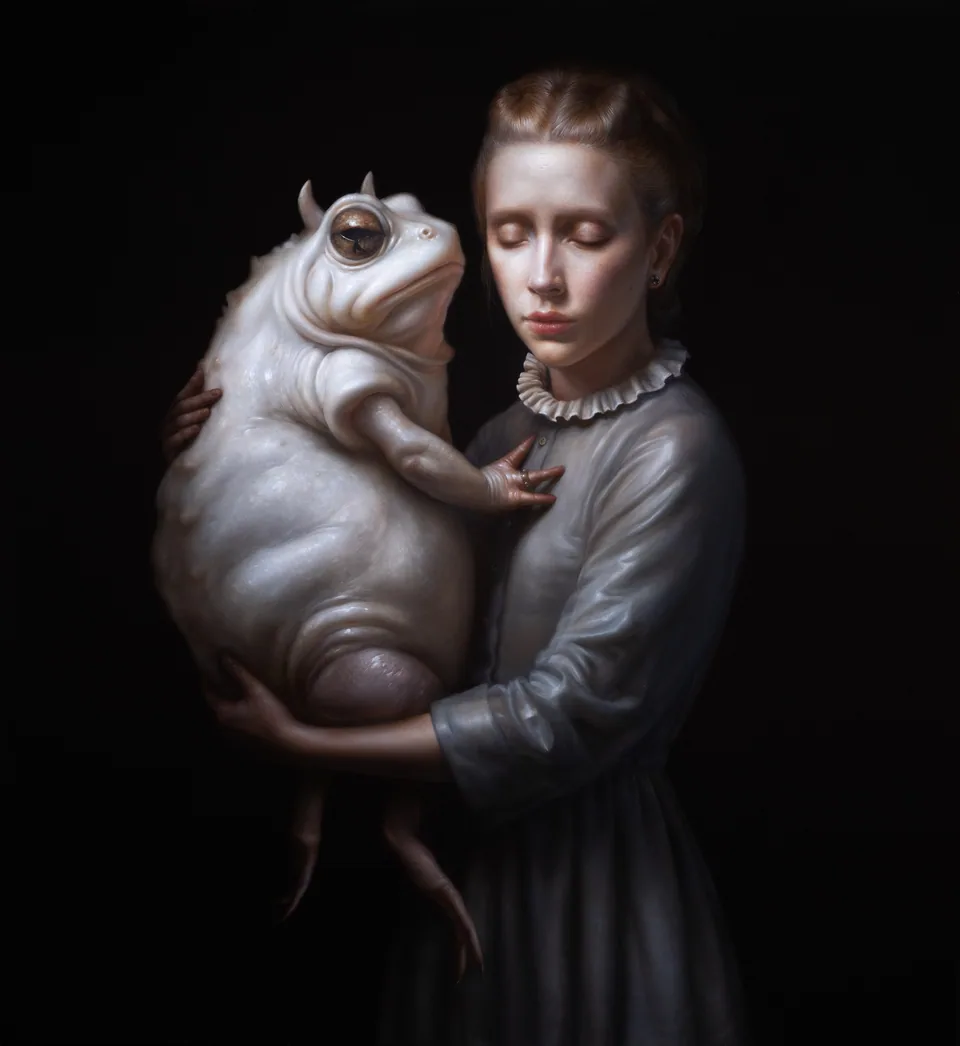 A girl with closed eyes cradling a pale toad.